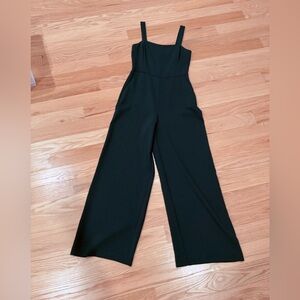 Green Aritzia Jumpsuit - great staple for any party!